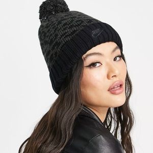 Nike leopard print pom pom cuffed beanie in black